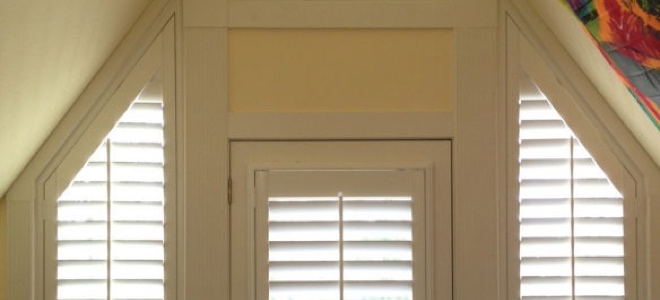 Angled windows around a door.